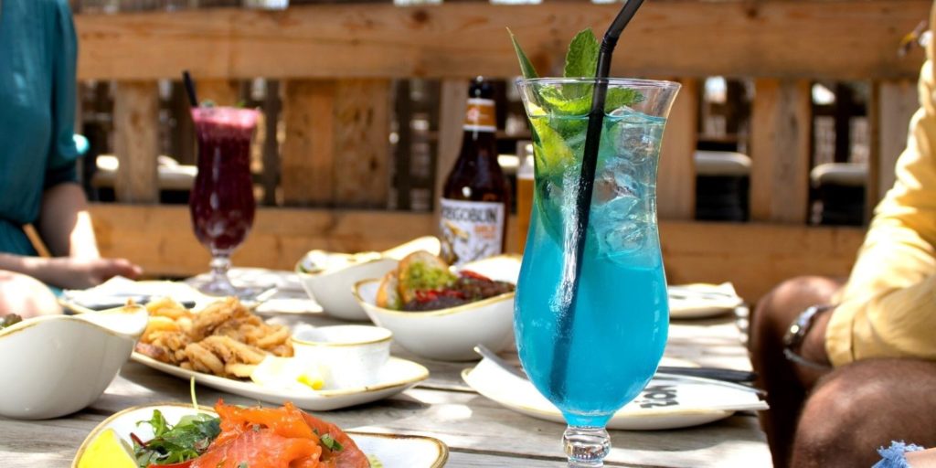A picture containing table, food, person, indoor

Description automatically generated